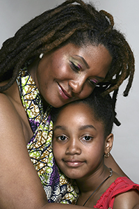 mother and daughter hugging.