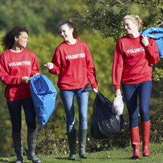 Girls volunteering in a park