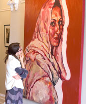 Girl looking at painting