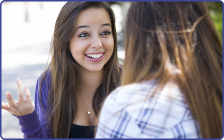 Two girls talking