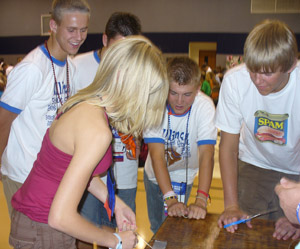 Largent demonstrating bracelet making